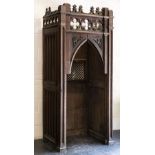 * Confessional Box. A section of a Victorian Gothic carved oak confessional box