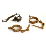 * Manacles. A pair of early 19th century harness-yoke iron manacles