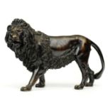 * Bronze Lion. A 19th century bronze model of a lion