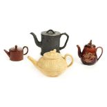 * Teapots. An early 19th century black basalt teapot, probably Spode