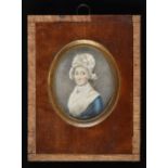 * Miniature. Portrait of a woman in a mob cap, circa 1800