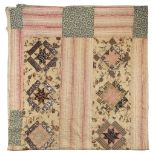 * Quilt. An early Victorian patchwork quilt, English