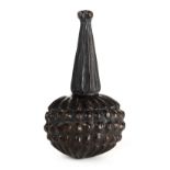 * Snuff bottle. A Zulu carved wood snuff bottle