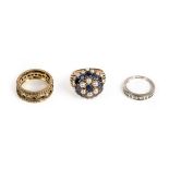 * Rings. A yellow metal sapphire and pearl cluster ring plus two others