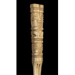 * Marquesas Islands. A French Polynesia carved bone fan handle