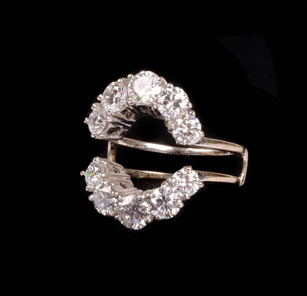 * Ring. An 18ct white gold jacket ring set with 10 brilliant cut diamonds - Image 2 of 5