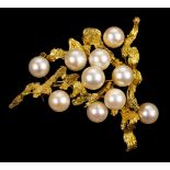 * Brooch. A Continental 14K gold and pearl brooch