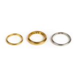 * Rings. Two 22ct gold wedding bands plus a platinum ring