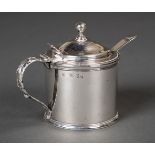 * Mustard pot. A George III silver mustard pot