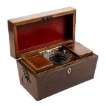 * Tea caddy. A Regency rosewood sarcophagus tea caddy