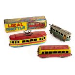 * Trams. A collection of toy trams and cars etc.