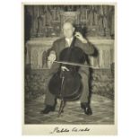 * Casals (Pablo, 1876-1973). Two identical vintage gelatin silver print photographs of the cellist