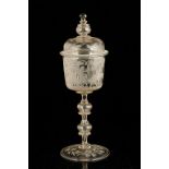 18TH CENTURY LIDDED GLASS GOBLET with engraved classical , vine scenes , double knop stem and