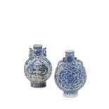 CHINESE BLUE AND WHITE MOONFLASK decorated with scaly serpent dragons with pierced lug side handles,