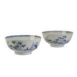 PAIR OF BLUE AND WHITE 'NANKING CARGO' BOWLS, QING DYNASTY, 18TH CENTURY, the rising rounded sides