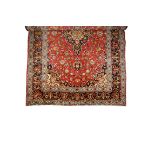 TABRIZ STYLE SMALL CARPET, the central rectangular maddor ground with a dark blue and ivory