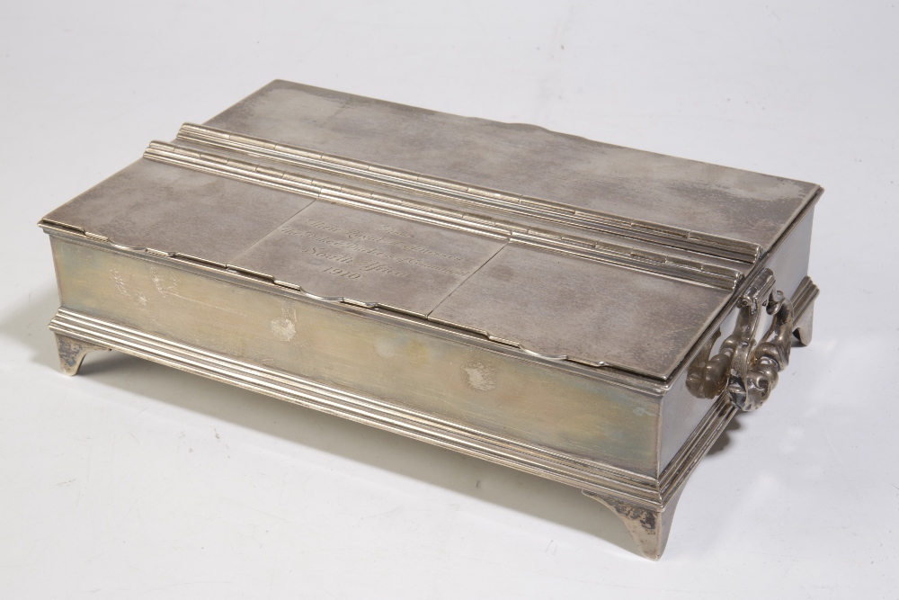 SOUTH AFRICA INTEREST: SILVER INKWELL of shaped rectangular form, inscribed "From Their Royal