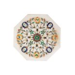 AN INDO-PERSIAN OCTAGONAL ALABASTER PANEL inlaid with semi-precious stones including malachite,