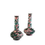 NEAR PAIR OF GREEN AND WHITE PINK-GROUND PEKING GLASS VASES, QING DYNASTY, 18TH CENTURY, the