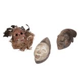 THREE TRIBAL MASKS, PUNU, YAURE AND IBIBIO