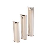 IN THE MANNER OF GEORG JENSEN: A SET OF THREE GRADUATED SILVER CANDLESTICKS