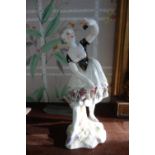 A CONTINENTAL PORCELAIN CABINET FIGURE OF A SPANISH DANCER