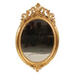 GEORGE III STYLE GILTWOOD OVAL WALL MIRROR