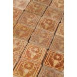 IMPORTANT COLLECTION OF ANGLO-FRENCH TERRACOTTA ENCAUSTIC FLOOR TILES