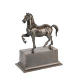 AFTER THE ANTIQUE: A BRONZE STUDY OF A PRANCING HORSE