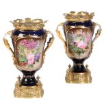 PAIR OF PARIS PORCELAIN AND GILT METAL MOUNTED VASES