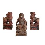 PAIR OF CARVED WOOD AND POLYCHROMZE PAINTED FU LIONS