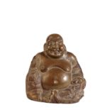 GILT COPPER ALLOY FIGURE OF A LAUGHING BUDDHA