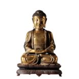 FINE GILT-BRONZE FIGURE OF SEATED SHAKYAMUNI