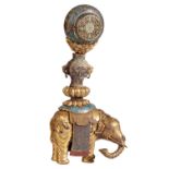 FINE GILT BRONZE AND CLOISONNE CAPARISONED ELEPHANT WATCH CASE