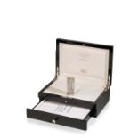 ALFRED DUNHILL: A LIMITED EDITION "GREAT GOLF COURSES OF THE WORLD" SILVER LIGHTER