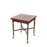EMPIRE MAHOGANY AND PARCEL-GILT ENVELOPE CARD TABLE