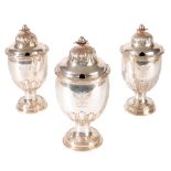 SET OF GEORGE II SILVER CONDIMENT VASES AND COVERS