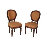 SET TWELVE CONTINENTAL EBONISED AND ROSEWOOD DINING CHAIRS