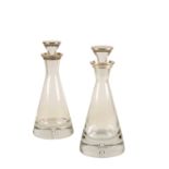 PAIR OF MATCHED SILVER MOUNTED GLASS DECANTERS