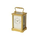 A FRENCH GILT BRASS STRIKING CARRIAGE CLOCK