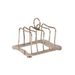 LIBERTY & CO: A SILVER FOUR DIVISION TOAST RACK