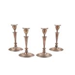 SET OF FOUR MATCHED VICTORIAN SILVER CANDLESTICKS