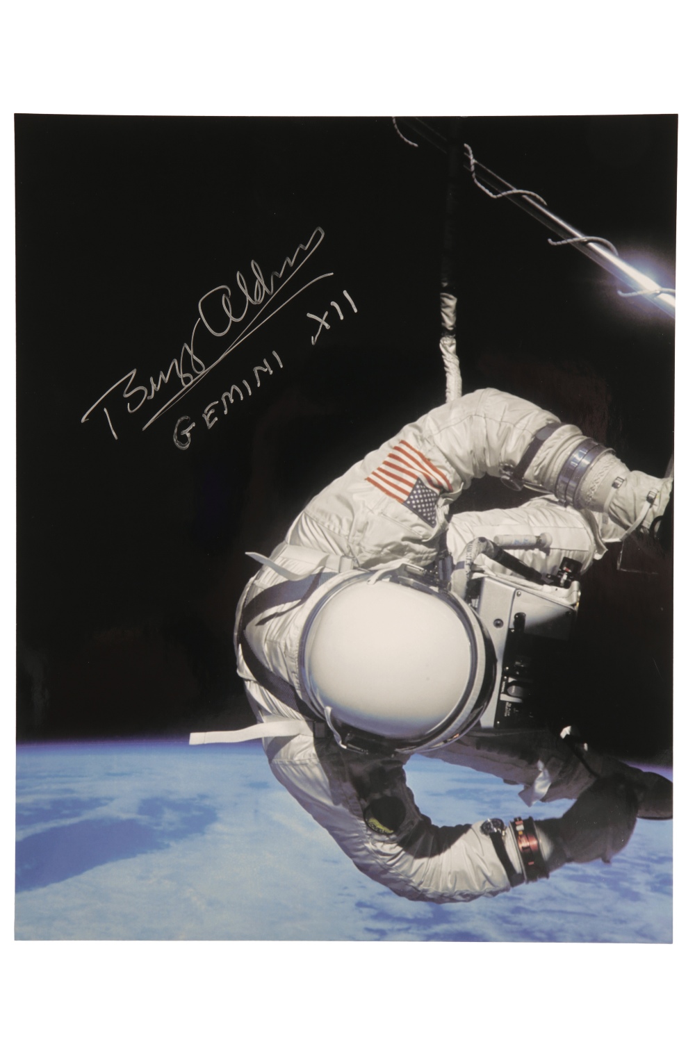 Buzz Aldrin, a Gemini spacewalk colour photograph signed and annotated 'Buzz Aldrin GEMINI XII'
