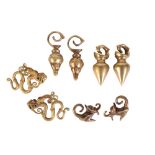 FOUR PAIRS OF BRASS STYLISED DAYAK EARRINGS