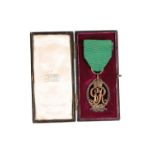 CASED GEORGE 5TH ROYAL NAVAL RESERVE OFFICERS DECORATION