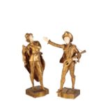 AUGUSTE MOREAU (1834 - 1917): A PAIR OF GILT BRONZE AND IVORY FIGURES