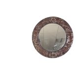 MANNER OF JOHN PEARSON: AN ARTS AND CRAFTS COPPER WALL MIRROR