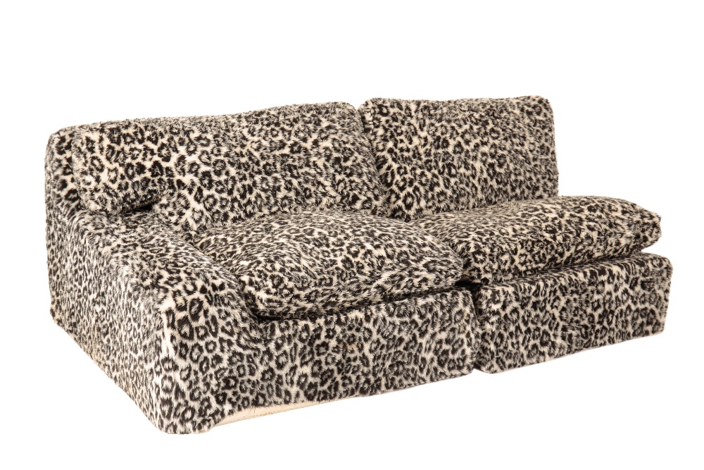 DAVID SYLVESTER: A LEOPARD PRINT "L" SHAPED SOFA