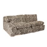 DAVID SYLVESTER: A LEOPARD PRINT "L" SHAPED SOFA