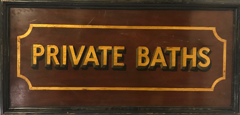 DECORATIVE MAHOGANY GILT PAINTED WALL SIGN " PRIVATE BATHS"